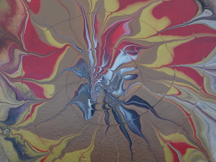 Close-up of Gold Burst, showcasing metallic gold and bronze hues blending with deep reds and blacks.
