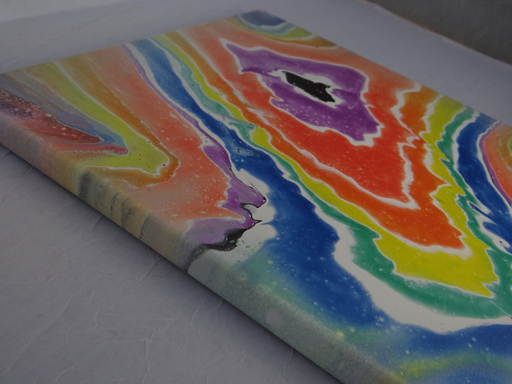 Side view of Rainbow Geode, highlighting the edge-wrapped fluid rainbow design for a seamless look.