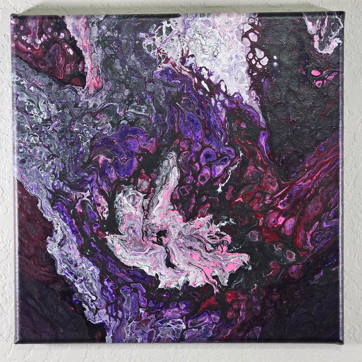 Explosion – 12x12 Acrylic Pour Canvas Painting featuring a dramatic pink and white burst from a deep violet and black background.
