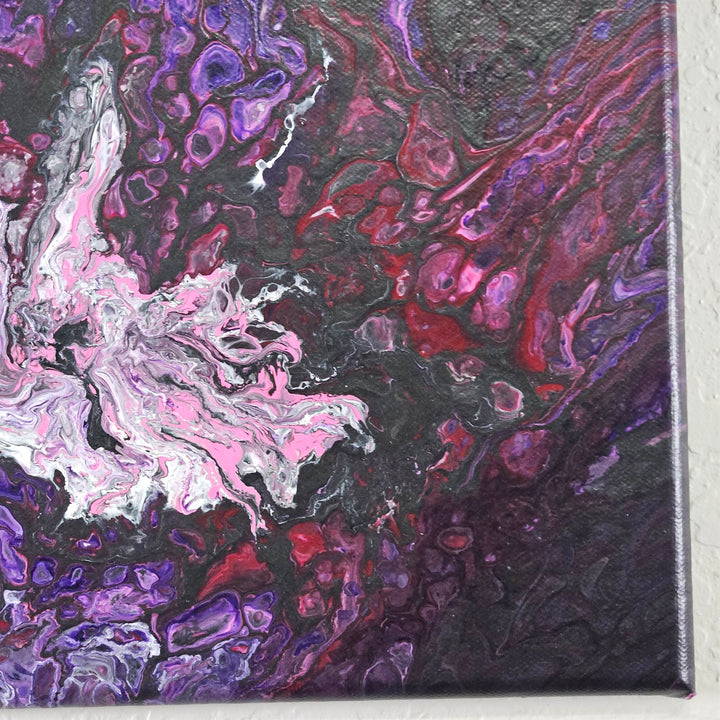 Close-up of Explosion acrylic pour painting showcasing fluid movement and intricate color blending.