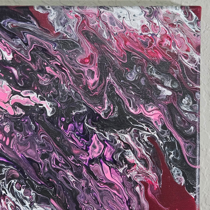 Upper right corner of Swirly Cells acrylic pour painting featuring dynamic color mixing and rich marbled textures.